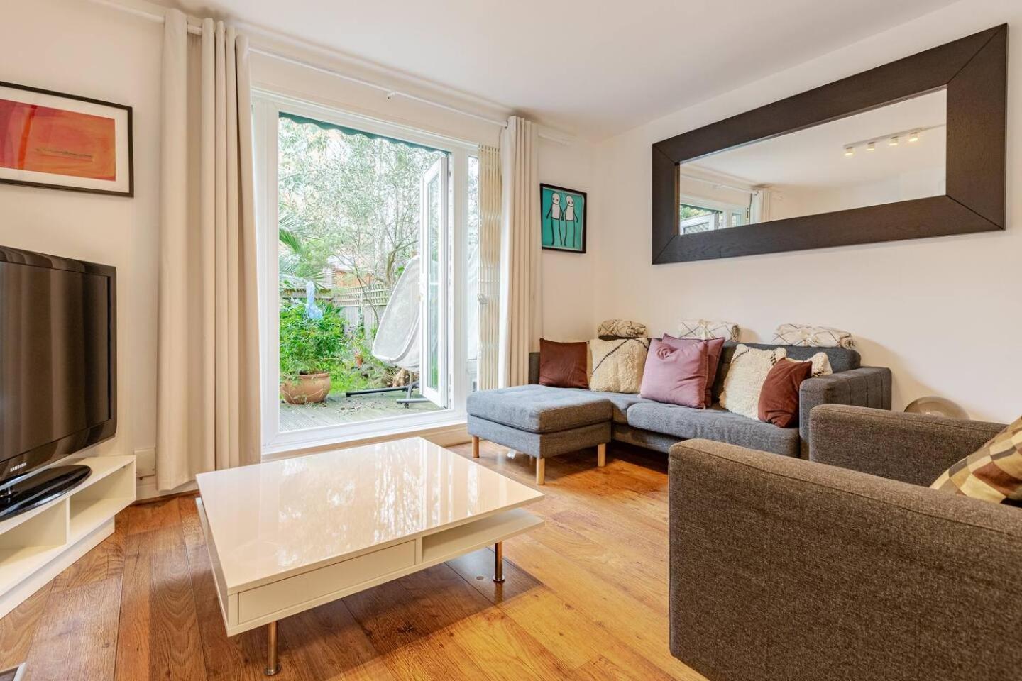 Charming 2-bed Garden Flat Apartamento *